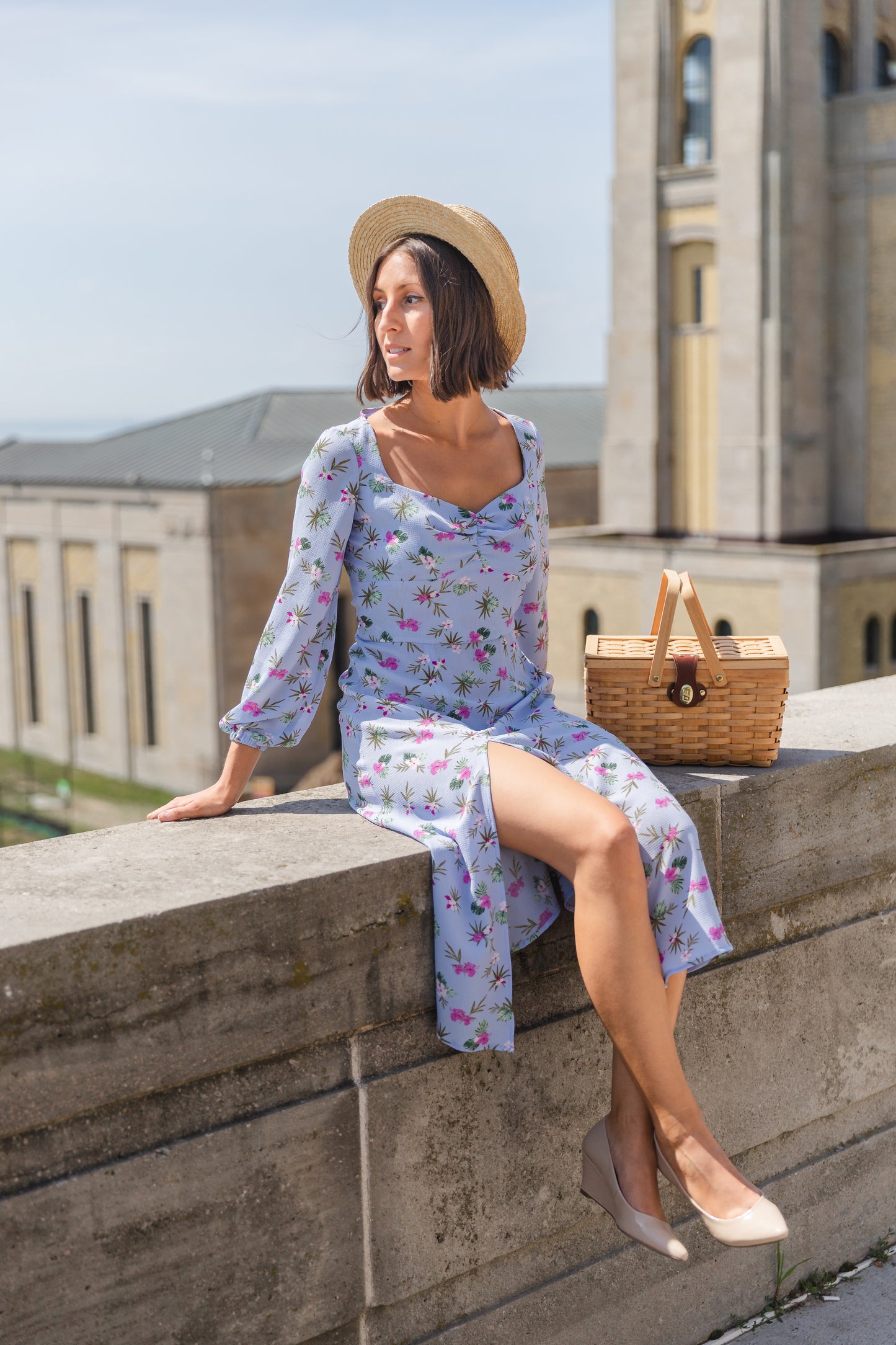 Ethical and sustainable clothing made in Canada - Pros and Cons Apparel. Eloise Dress- Blue floral A line dress. Medium length with long billowy sleeves and elastic sleeve opening. Midi skirt has loose flowing shape and high slit. Bodice includes gathered front and sweetheart neckline.