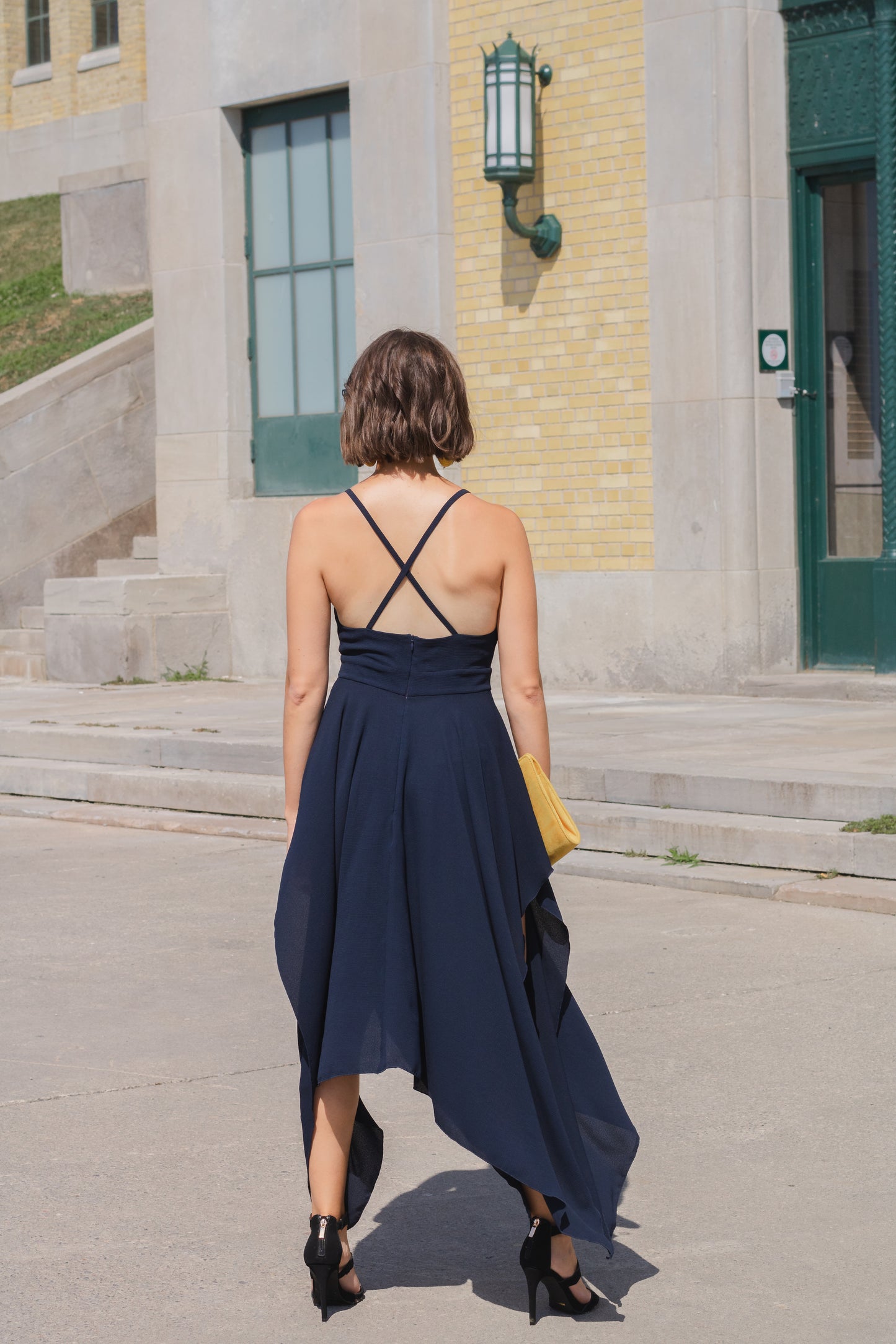 Ethical and sustainable clothing made in Canada - Pros and Cons Apparel. Long boho dress .Blue flowy maxi hi lo skirt with twist V neck, spaghetti straps, sleeveless and cut outs