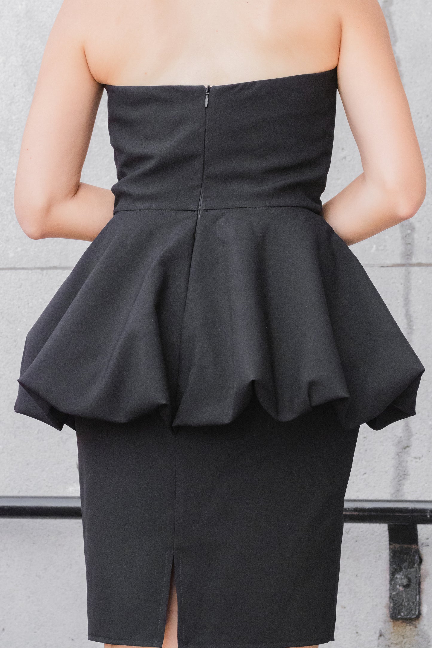Ethical and sustainable clothing made in Canada - Pros and Cons Apparel.  Strapless little black dress - sweetheart neckline sleeveless mini dress - peplum skirt LBD