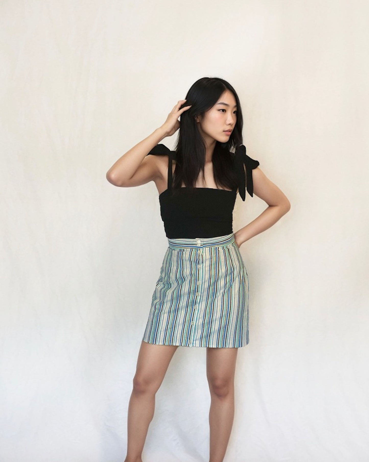 Ethical and sustainable clothing made in Canada - Pros and Cons Apparel. Striped high waisted mini skirt. Button up short Skirt